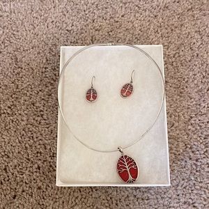 Matching silver necklace and earrings